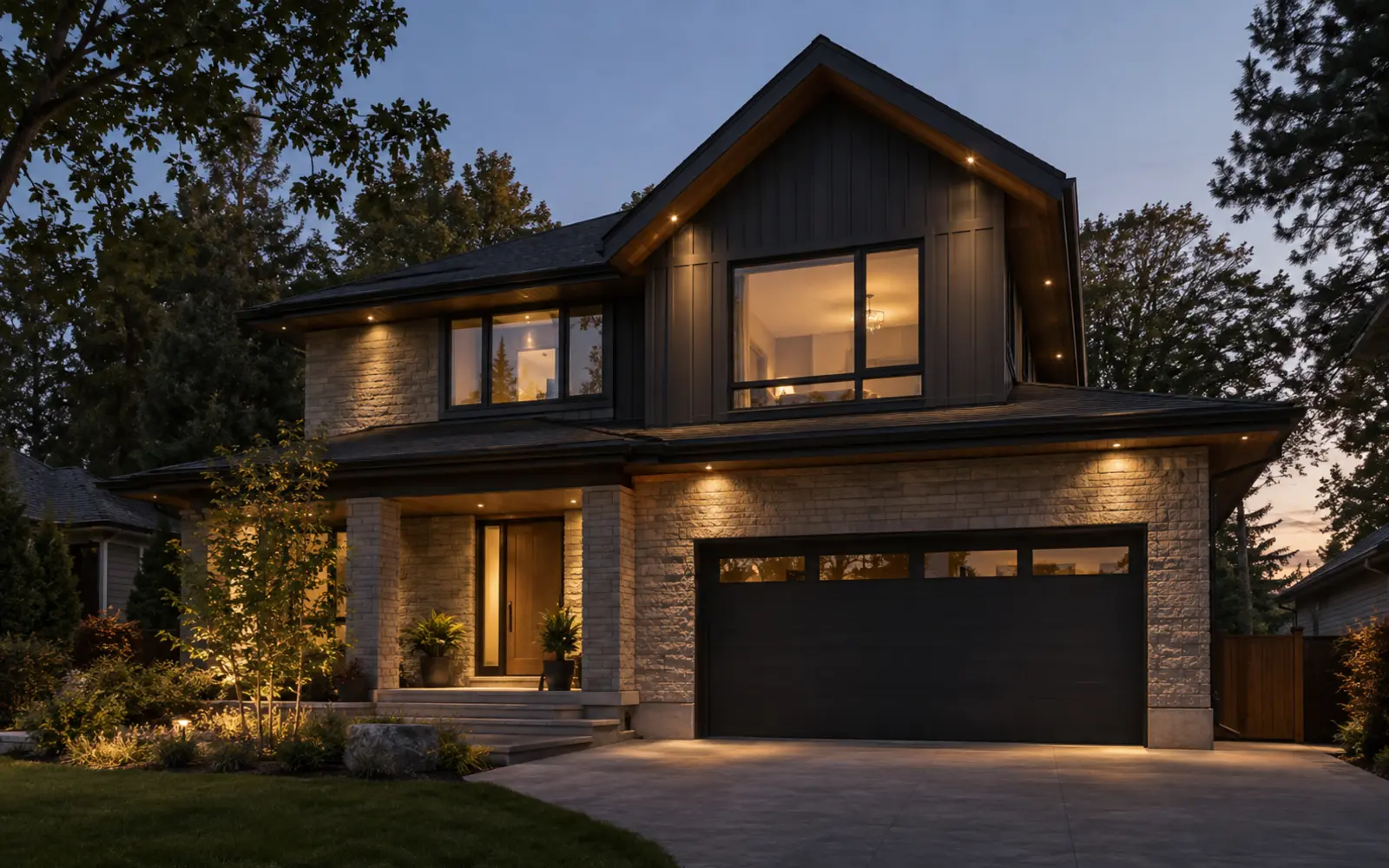 Warm eave lighting on a two-storey home at dusk
